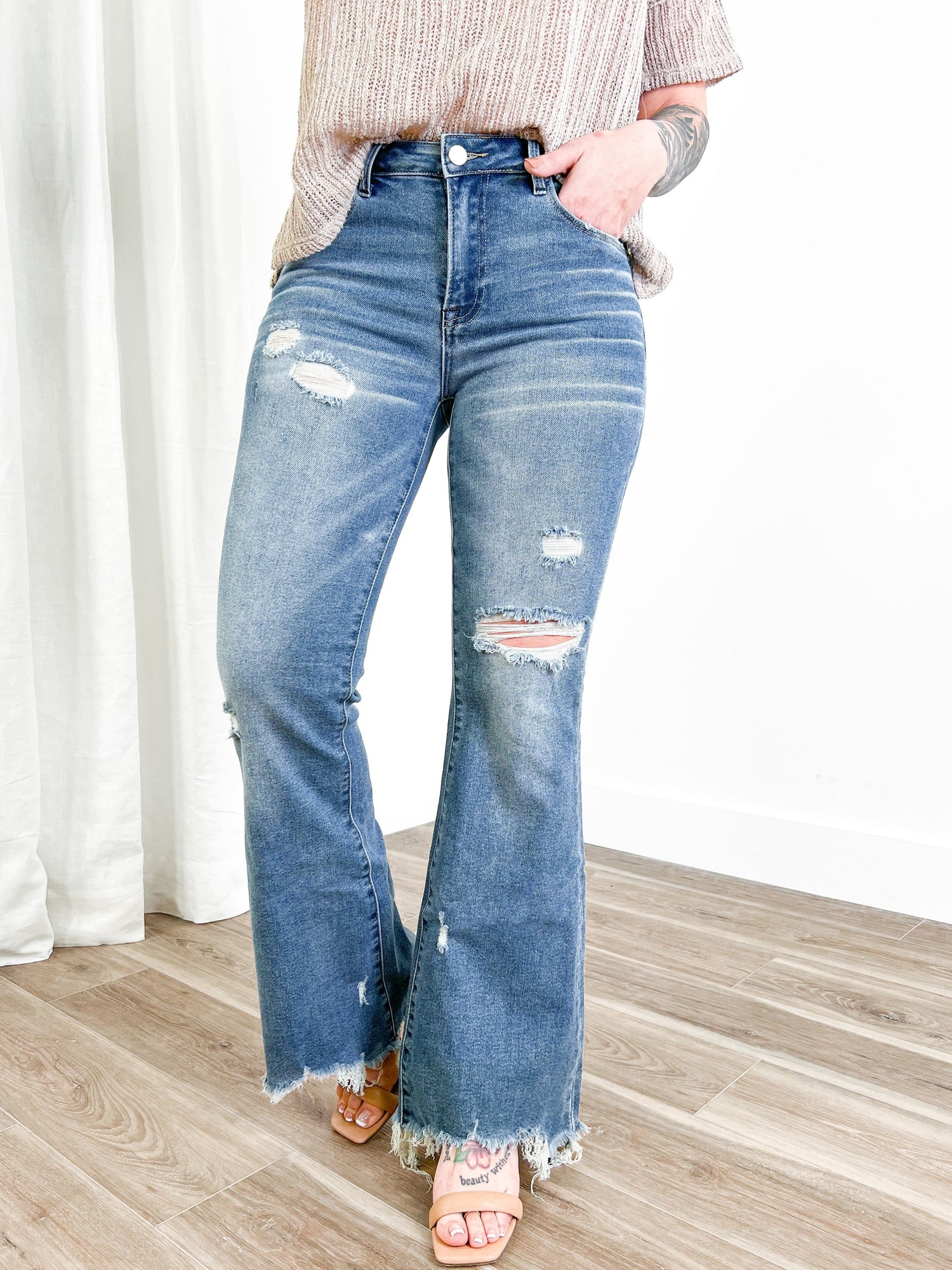 Risen Medium Wash Distressed Flare Jeans